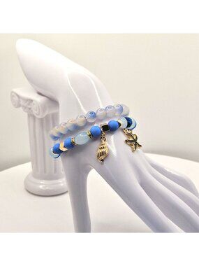 Ocean-Themed Beaded Stretch Bracelets With Gold Tone Charms Blue And Opalescent